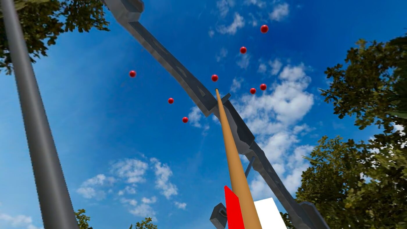 Bow raised toward a blue sky with a scatter of clay pigeons arcing overhead.