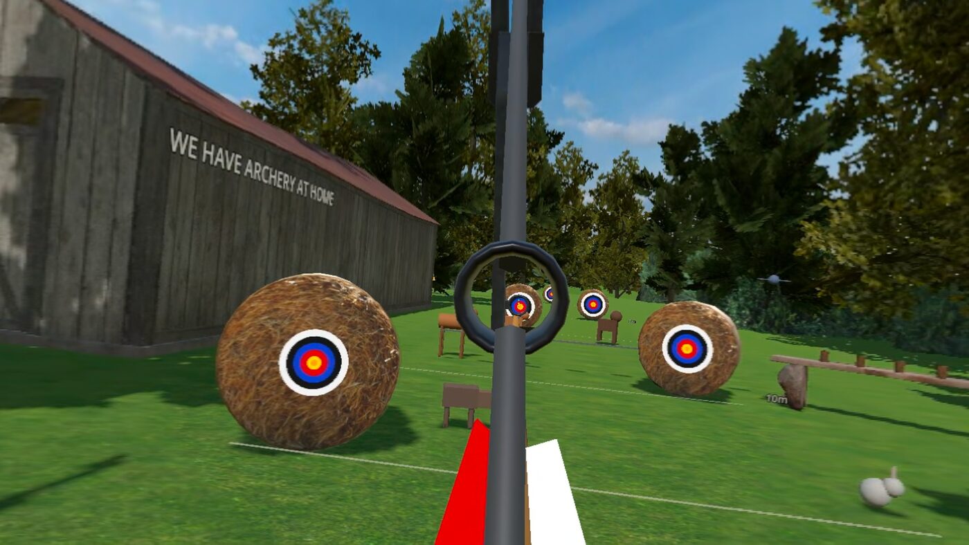Looking through a compound bow's peep sight, the ring framing a distant bullseye.